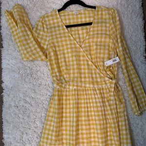 Yellow and white wrap dress